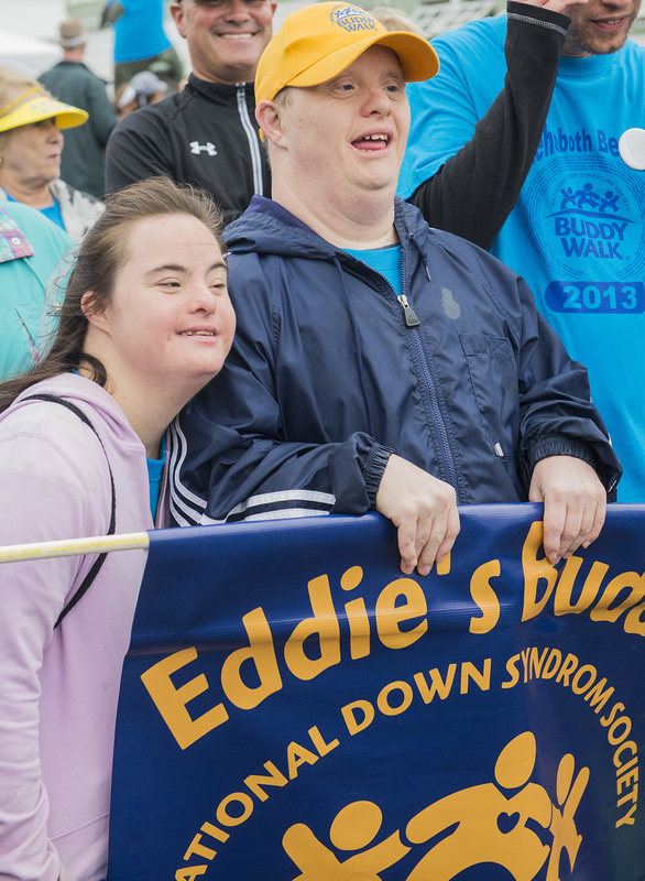 Ashley Tieste and Eddie Drake of team Eddie's Buddies pose for photos before the walk. BY DENY HOWETH